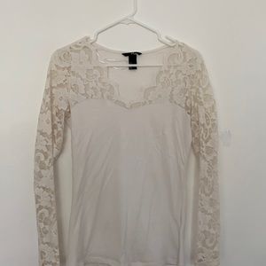 H&M shirt, cute cut in the front and fancy sleeves